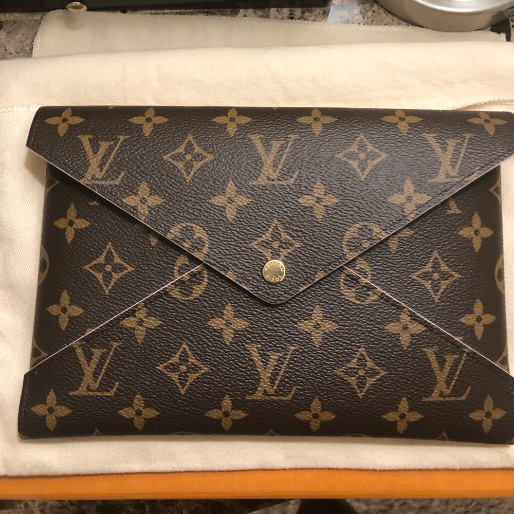 Authentic Louis Vuitton Kirigami clutch.